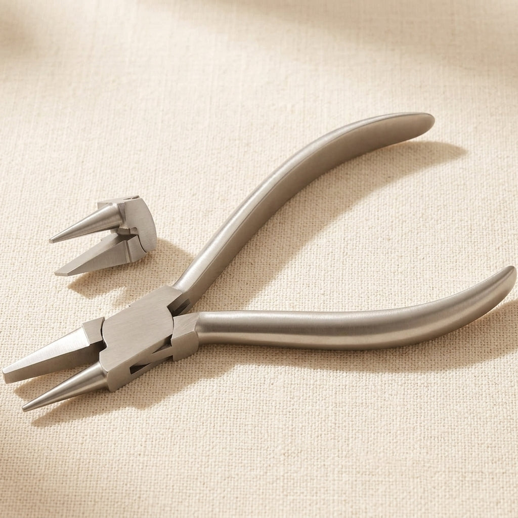 Side view of the 140mm jewellery pliers, highlighting the polished steel handles and jaw construction