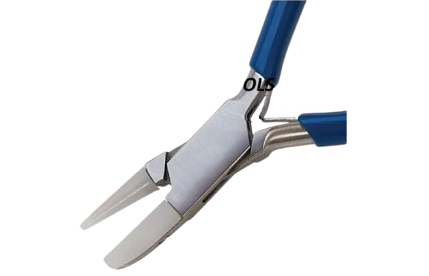 Close-up of parallel action jaws on stainless steel forming pliers with replaceable nylon inserts