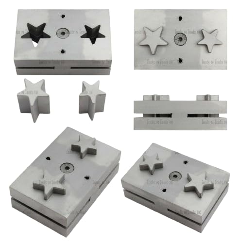 Close-up of star punch cutting a metal disc, showing the clean edge.