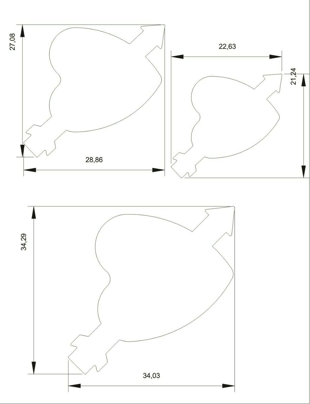 Close-up of the three steel heart and arrow punch cutters, showing different disc sizes for metal shaping.