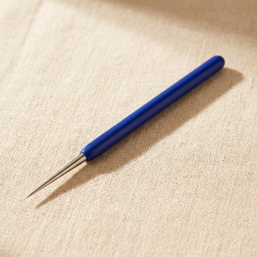 Close-up of the beading awl's rubber grip handle for comfortable crafting.