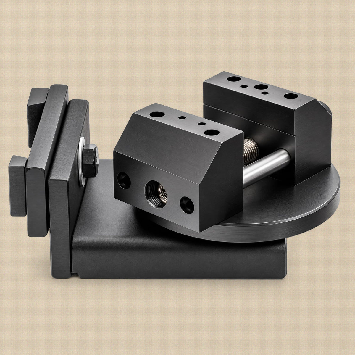Bench vice from the side, showing the drilled jaws, steel guide rod and rotating base on its mounting bracket