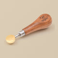 Brass head bezel pusher with hardwood handle