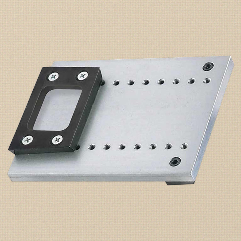 Mounting plate and bracket kit from the other side showing the bolt holes