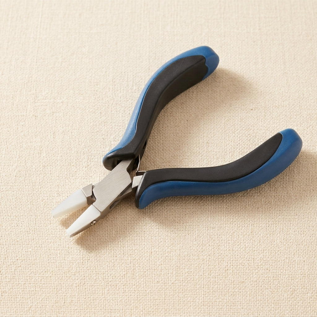 Close-up of the double nylon jaws on the 5-inch stainless steel jewellery pliers