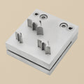 Front view of the 3-punch dolphin shape disc cutter set, showing the steel block and three punches.
