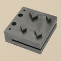 Steel disc cutter block with four wide heart-shaped punches arranged neatly.