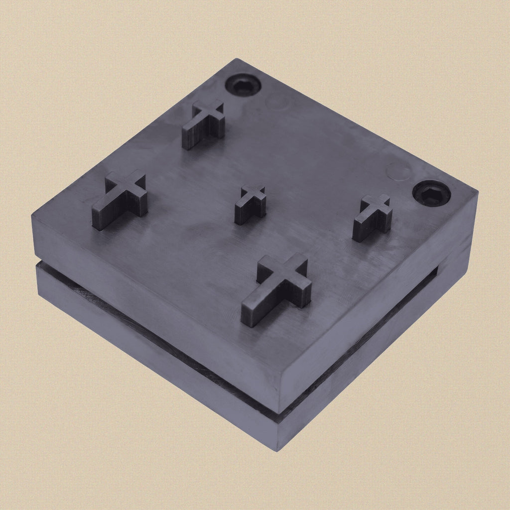 Hardened steel disc cutter set for Christian Cross shapes, showing the die block and five punches.