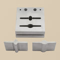 Bar and paddle disc cutter set with two punches and steel die block on a white background.