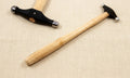 Silversmiths forming hammer with polished steel head for metal embossing and shaping.