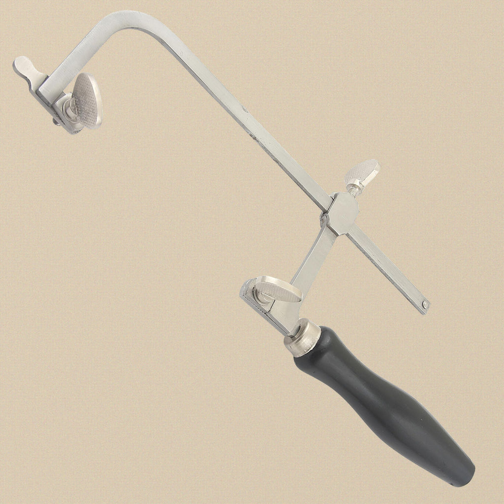 French style saw frame at an angle, showing the blade clamps