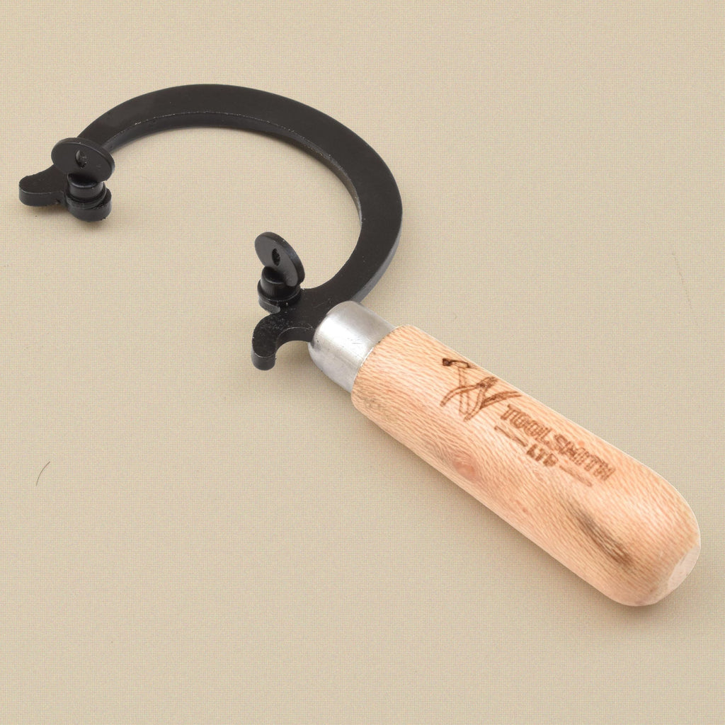 Mini saw frame from the other side showing the blade clamps