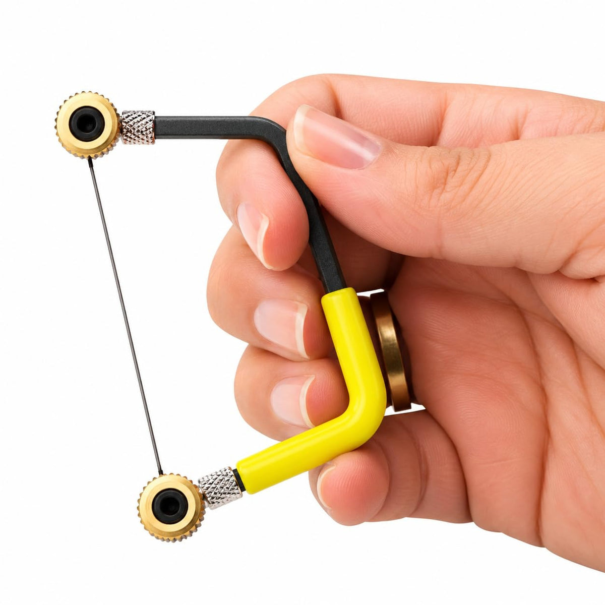 Miniature saw frame held in the hand with a blade fitted