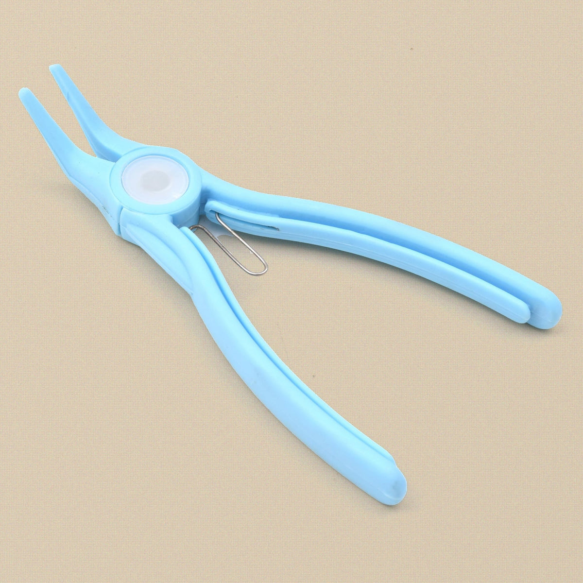 Light blue plastic bent chain nose pliers at an angle