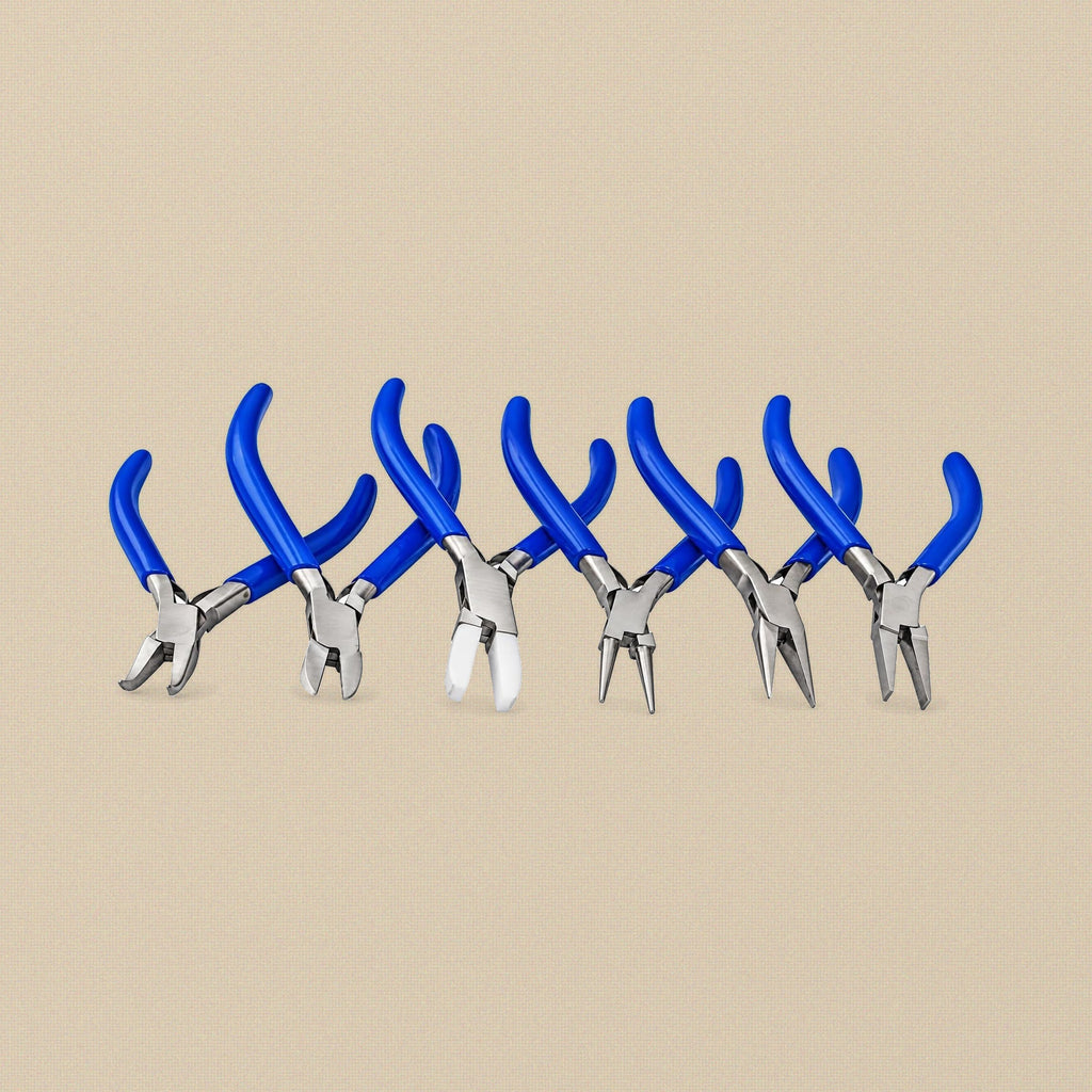 Six blue-handled jewellery pliers from the kit: round, chain, flat, nylon jaw, bent nose and side cutter