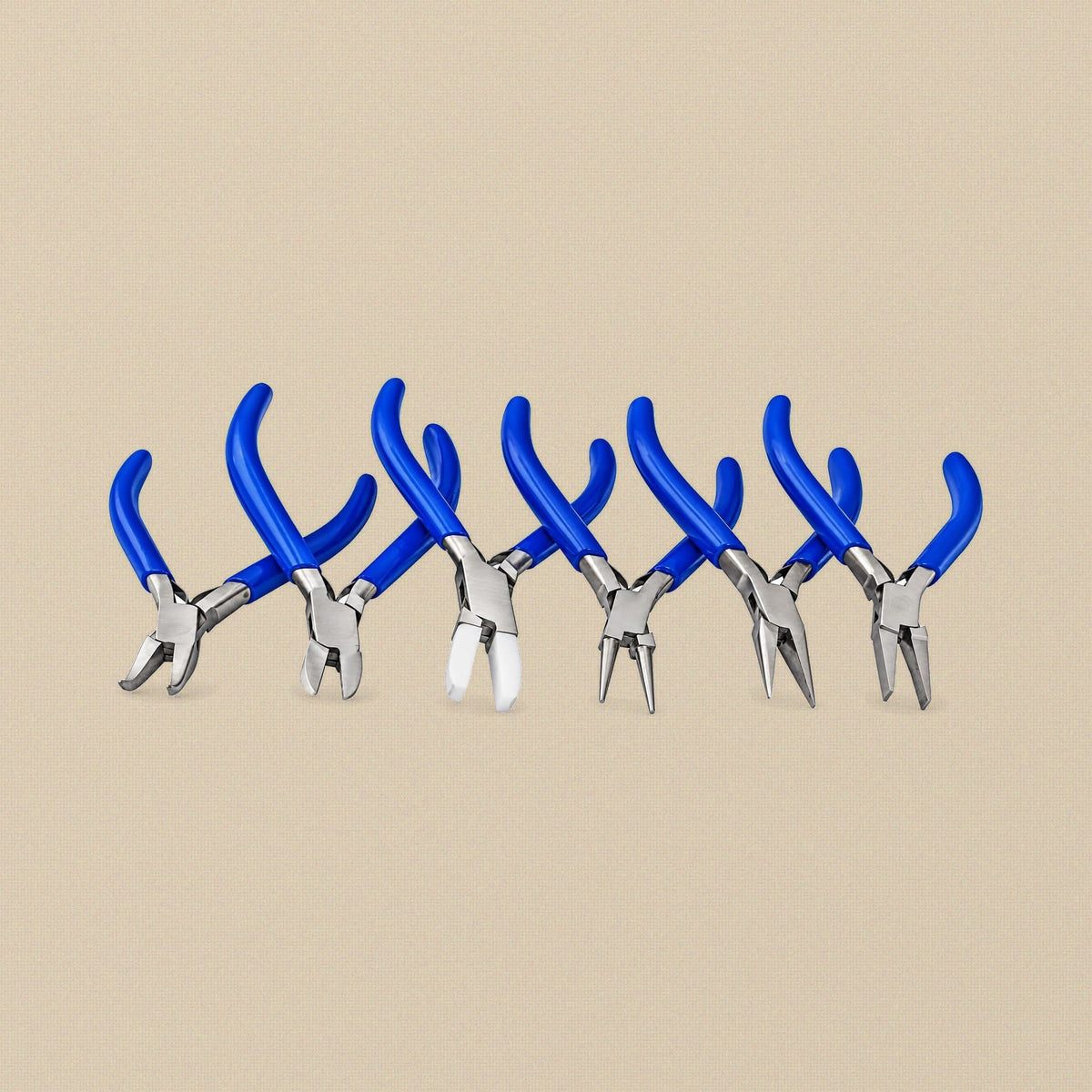 Six blue-handled jewellery pliers from the kit: round, chain, flat, nylon jaw, bent nose and side cutter