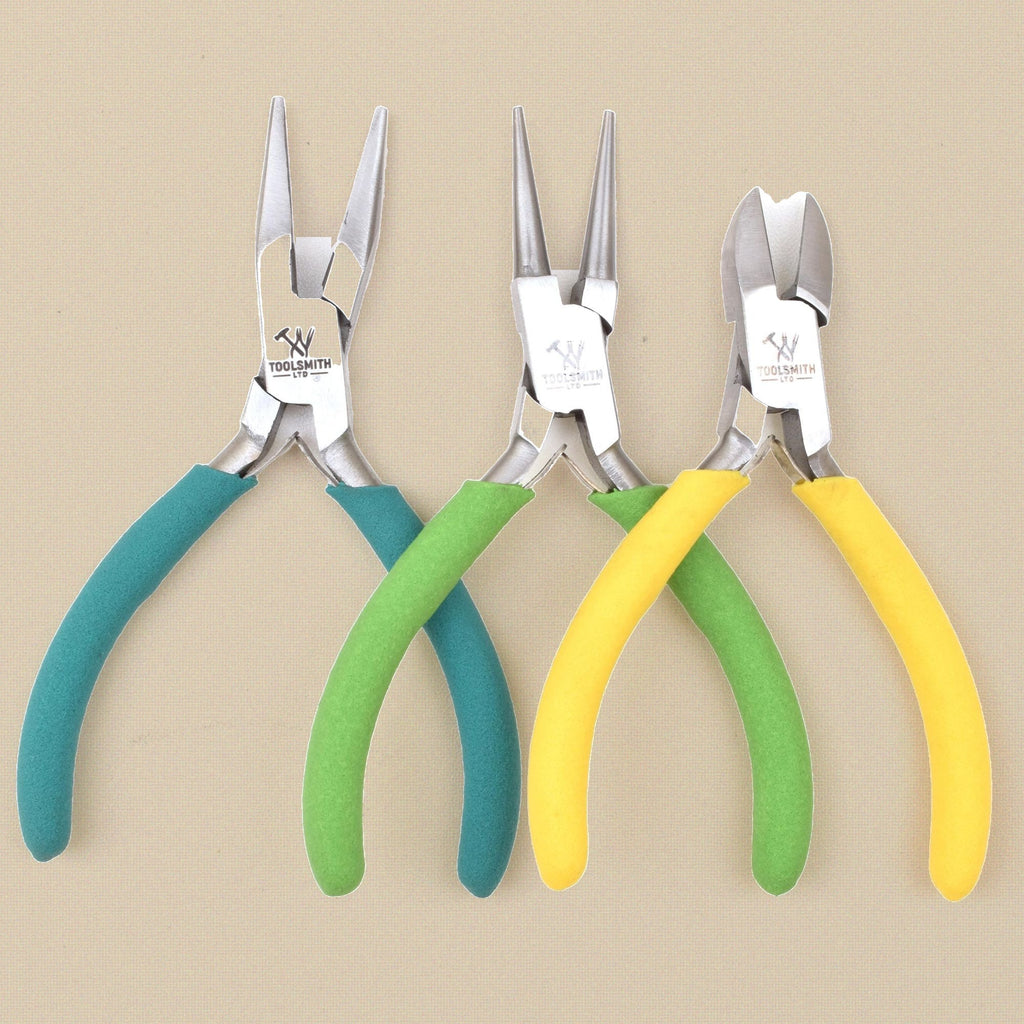 Pliers set standing on their handles