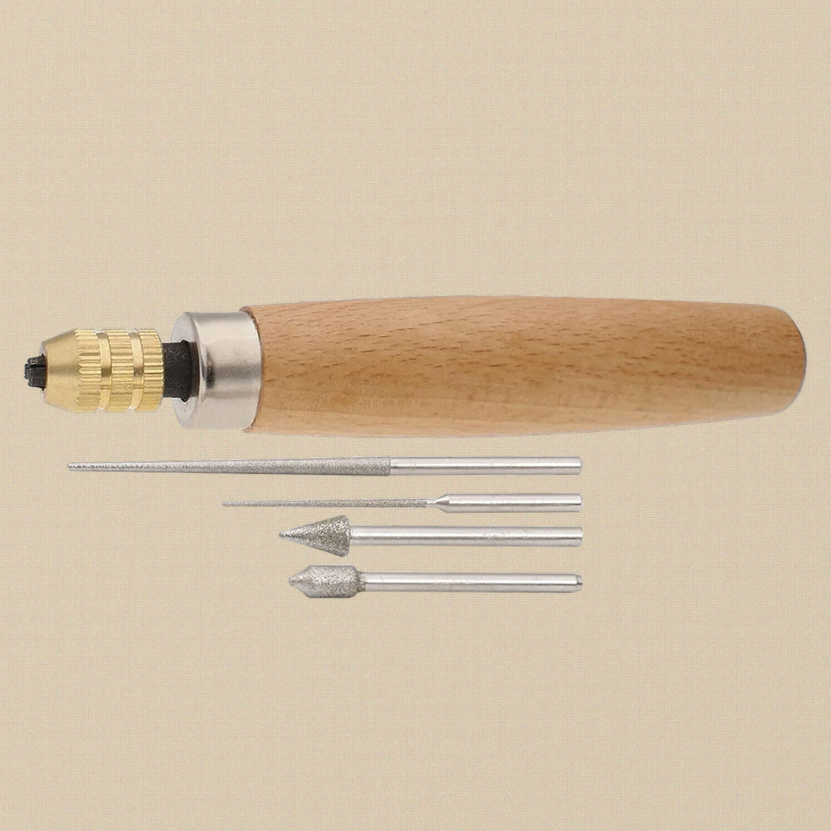 Bead reamer handle with the four tips laid alongside