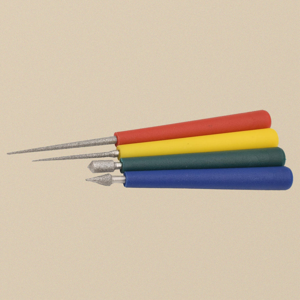 Bead reamer set laid flat, showing the four different points