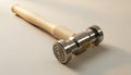 Jewellery texturing hammer with round bullseye head, steel construction, for metal forming.