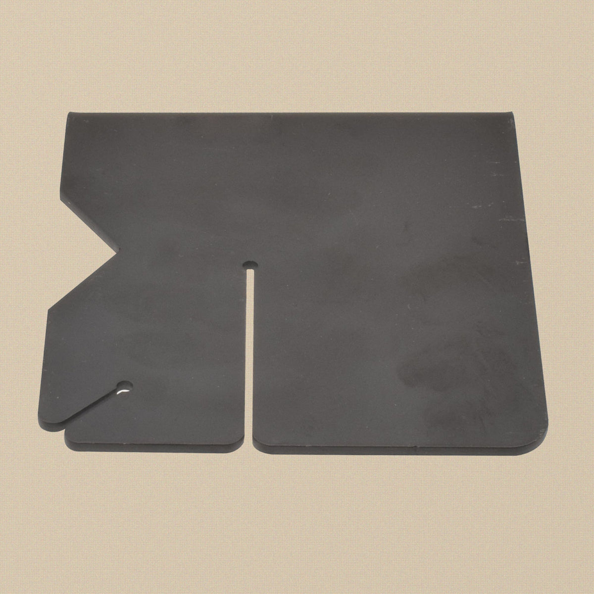 Sawing plate from above showing the V cut-out and slot