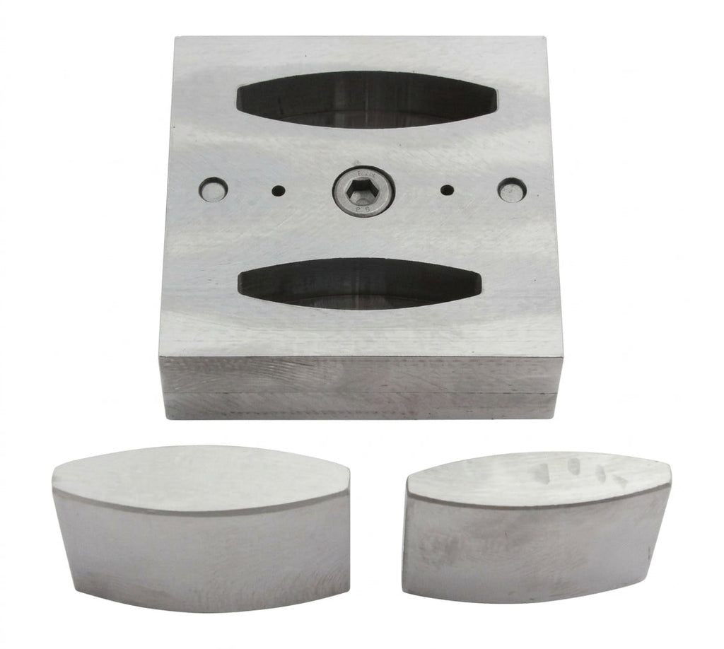 Close-up of the narrow oval steel disc cutter's punch mechanism for clean metal shaping.