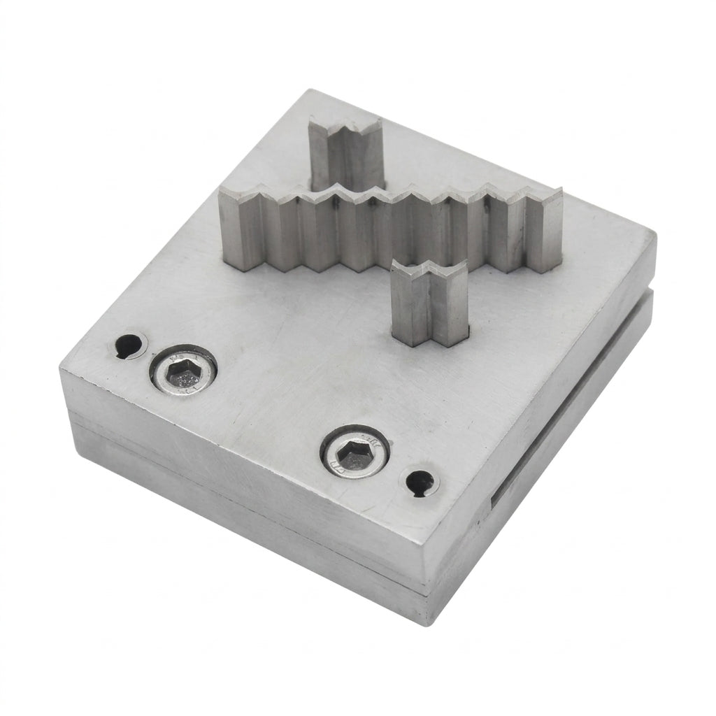 Close-up of the steel disc cutter's 3 wave punch shapes for jewellery blanks