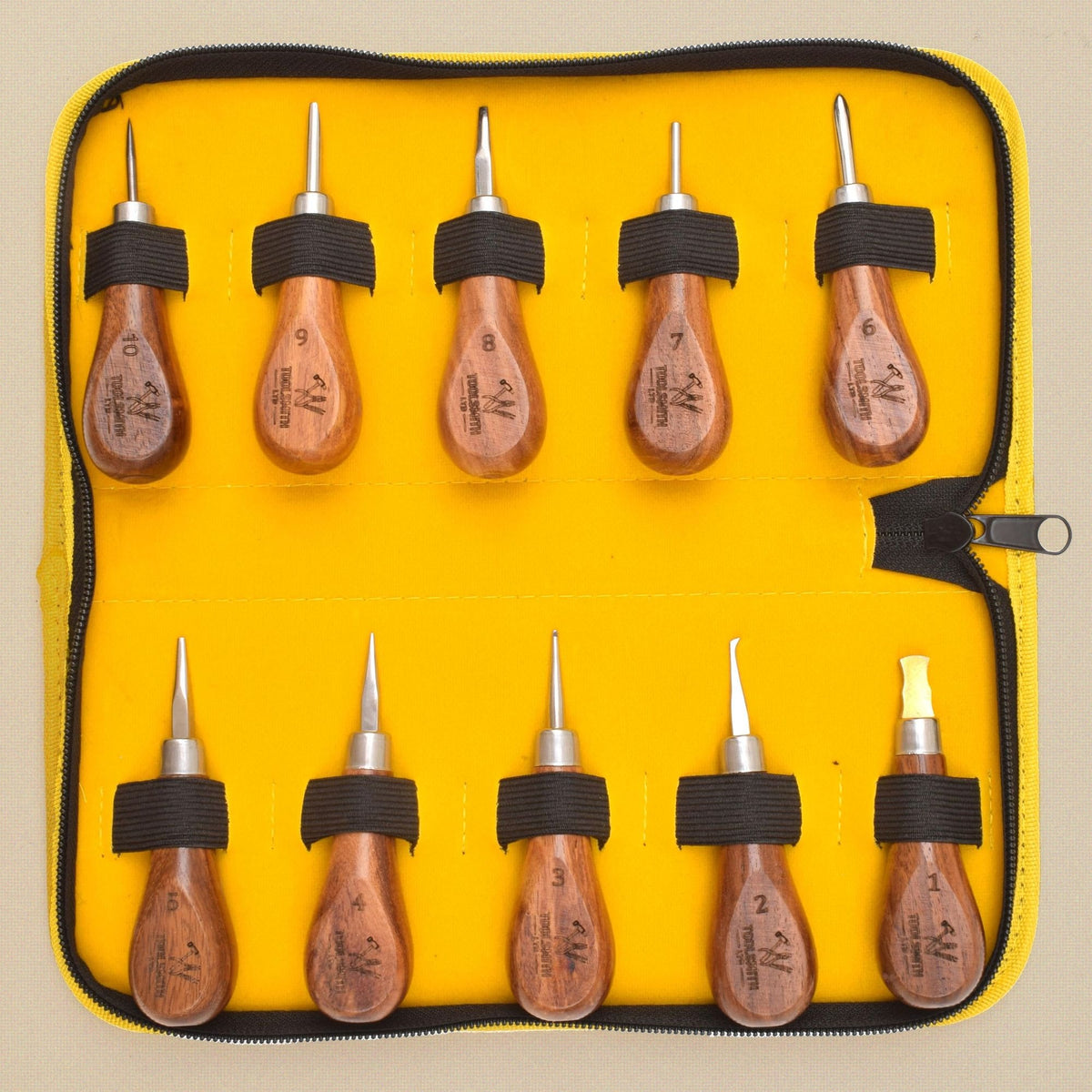 Stone setting tool set in its case, seen from above