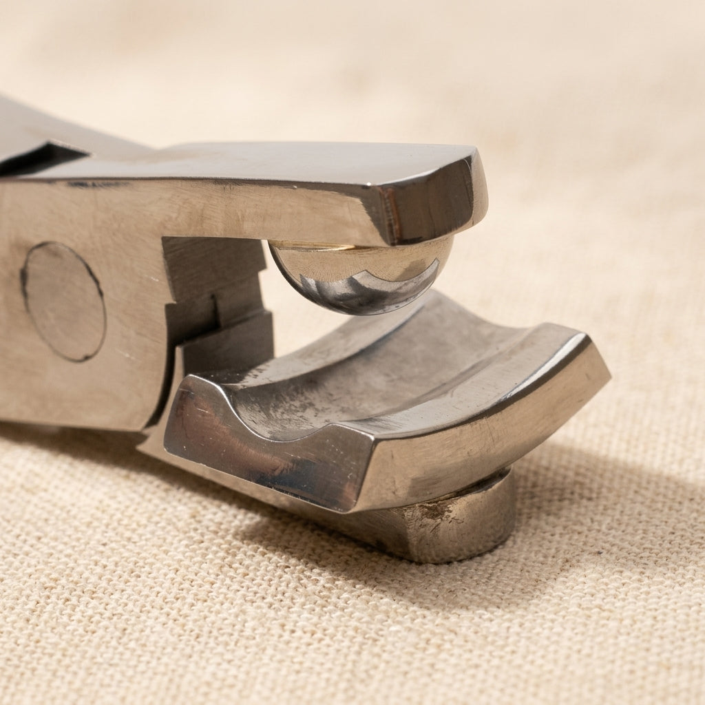 Close-up of Synclastic pliers jaws, showing parallel action for precise metal shaping