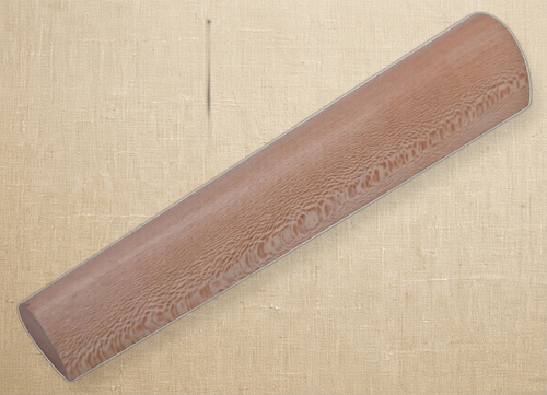 Close-up of the teardrop-shaped end of the wooden bracelet shaping mandrel