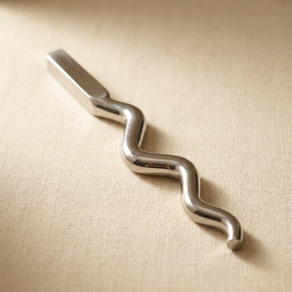 Close-up of the polished, sinusoidal surface of the hardened steel jewellery forming stake.