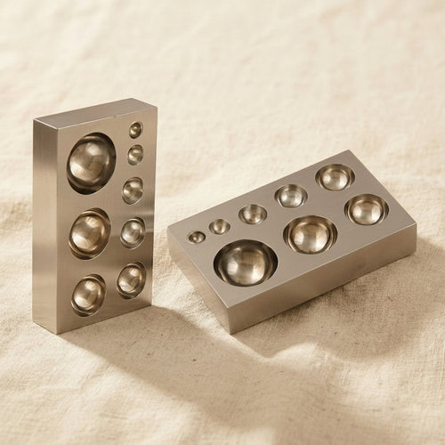 Mini steel dapping block with 8 half-sphere depressions for jewellery forming