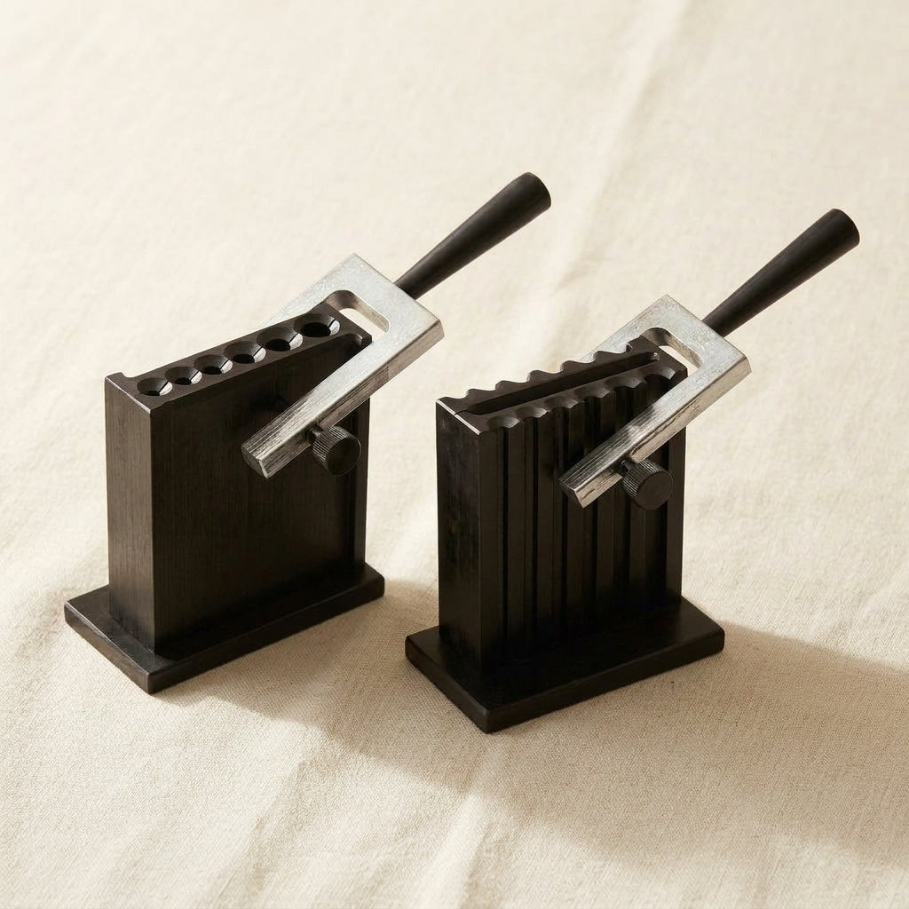Large reversible ingot mould for casting gold and silver into sheets, bars, or wires.