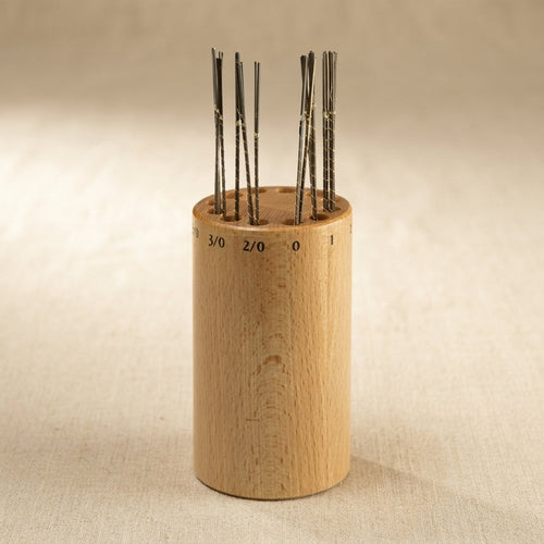 Wooden organiser for 12 jewellery saw blades, with helpful markings for jewellers.