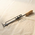 14 inch crucible tongs with wooden handle, a black metal jewellery casting tool for silversmiths.