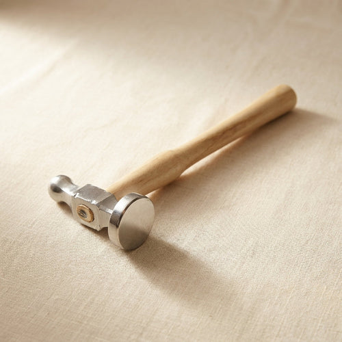 25mm German bow-face chasing hammer with wooden handle for metalworking and silversmithing.