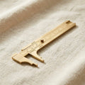 Brass sliding caliper with notched jaws for precise jewellery and watch measurements, 100mm