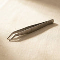 Stainless steel beading tweezers with angled tips for intricate jewellery crafting