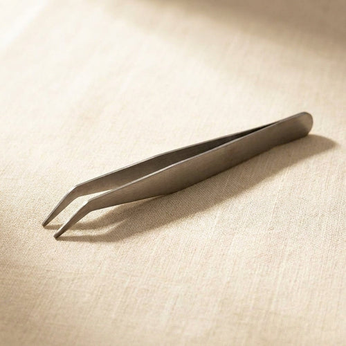 Stainless steel beading tweezers with angled tips for intricate jewellery crafting