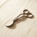Curved duckbill scissors with offset handles, stainless steel, for fabric and craft work