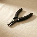 Black metal jewellery hole punch pliers, 1.5mm aperture, parallel action for silversmithing