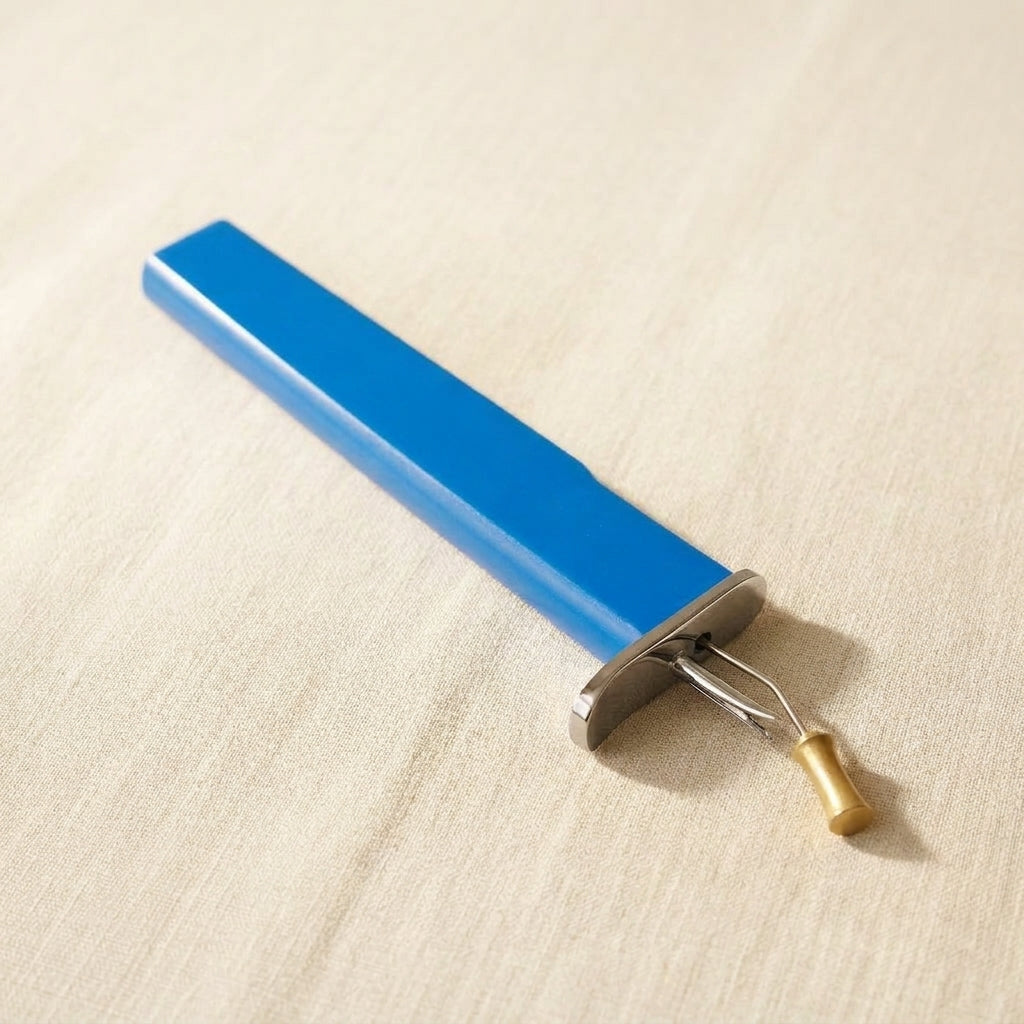 Blue professional jewellery knotting tool for consistent knots with beads.