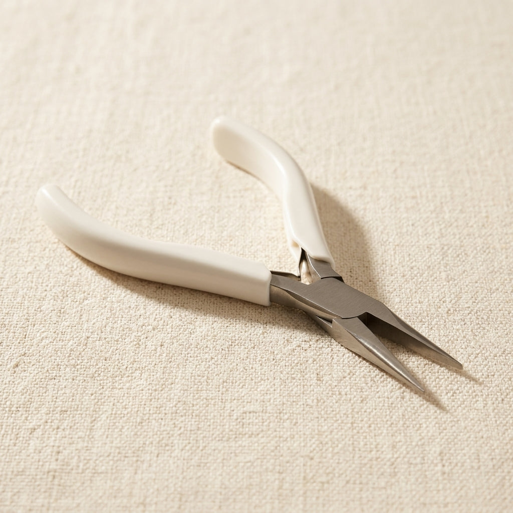 120mm chain nose pliers with white moulded handles for jewellery wire work.