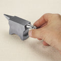 Double horn steel anvil block for metal forming and jewellery crafting, with a polished finish.