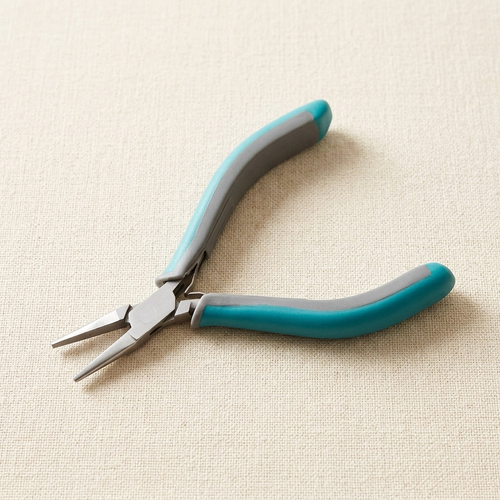 Flat nose pliers, 4.75 inch stainless steel with slim ergonomic two-toned grips.