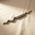 Heavy duty polished sinusoidal stake for jewellery forming, with parallel ends.