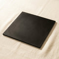 Heavy duty black rubber workbench mat for jewellery making, 12 x 12 inches, offering a large protective work surface.