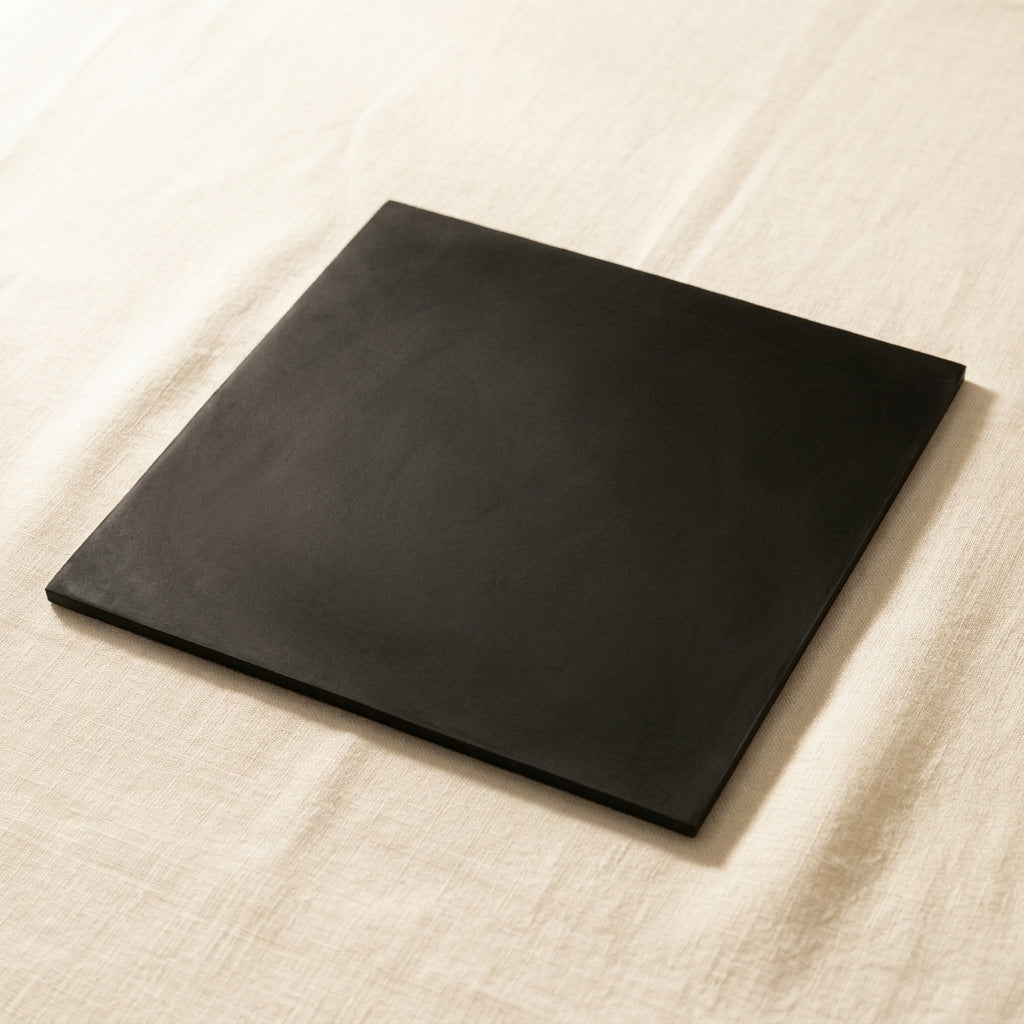 Heavy duty black rubber workbench mat for jewellery making, 12 x 12 inches, offering a large protective work surface.