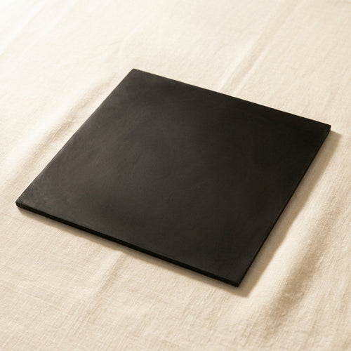 Heavy duty black rubber workbench mat for jewellery making, 12 x 12 inches, offering a large protective work surface.