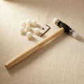 Jewellery planishing hammer with nylon head, interchangeable tips and wooden handle for silversmiths